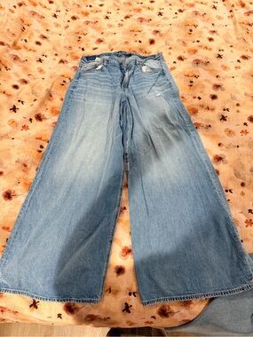 American Eagle Dreamy Drape Stretch Super High-Waisted Baggy Wide Led Jean
